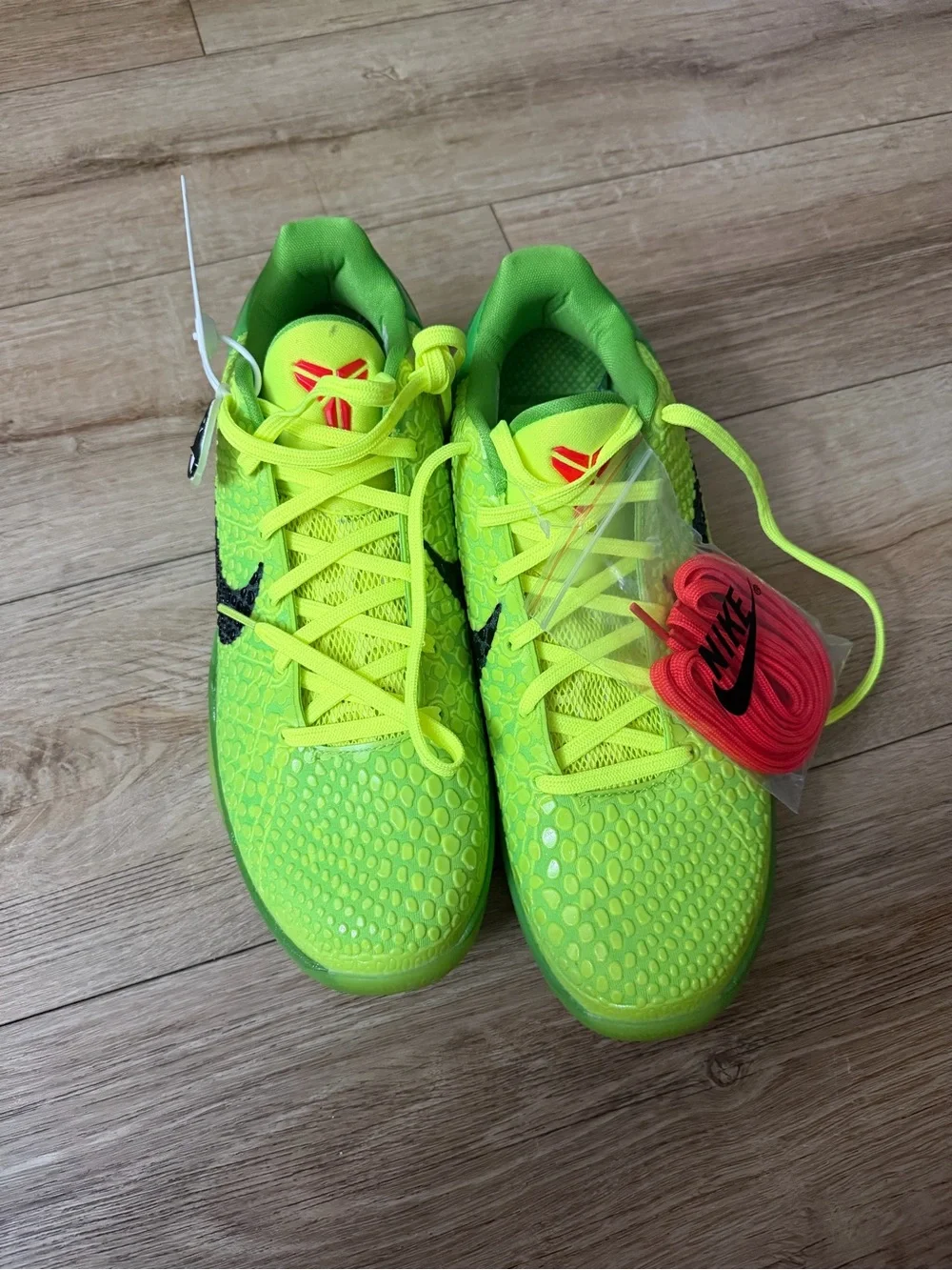 Nike Kids Bright Neon Green Athletic Sneakers with Extra Red Laces its new